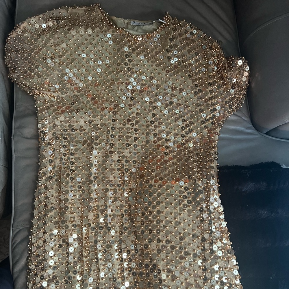 Women size 10-14 gold sequins dress. In great condition priced to sell!